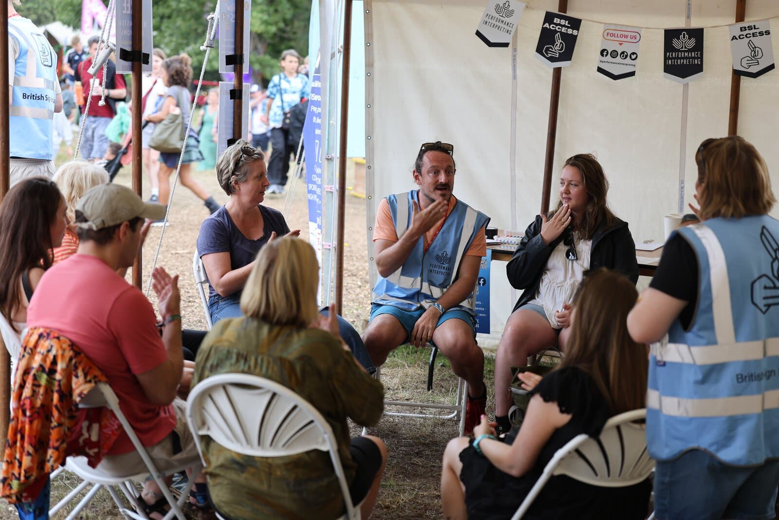 PI volunteers at a festival